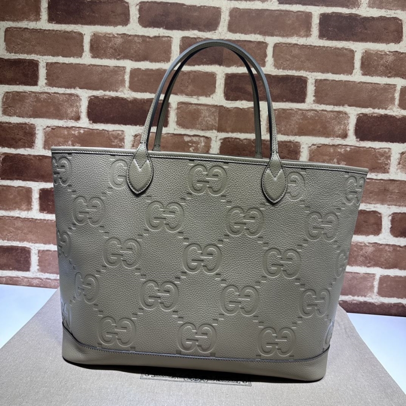G*u*i shopping bags